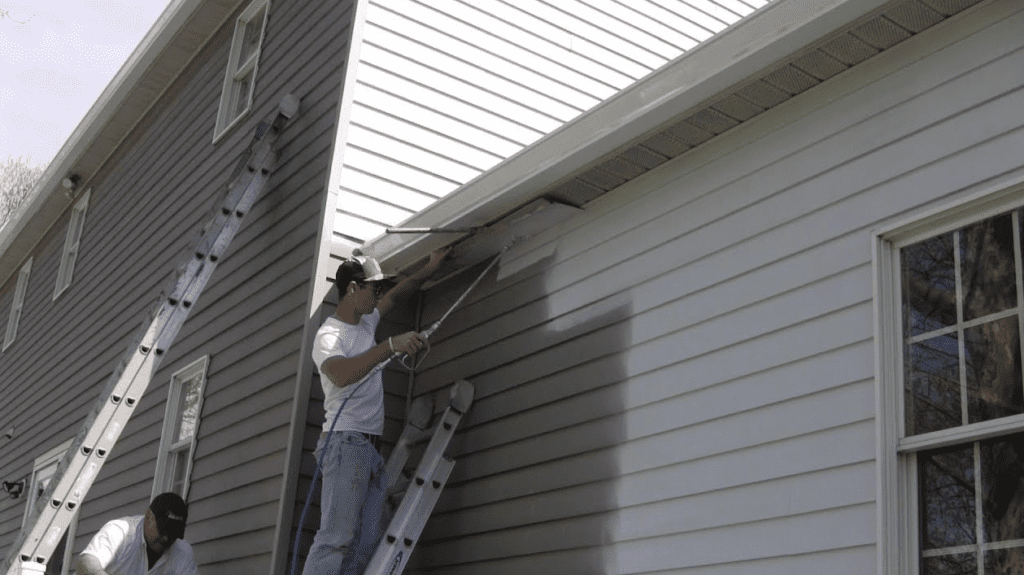 Spraying siding